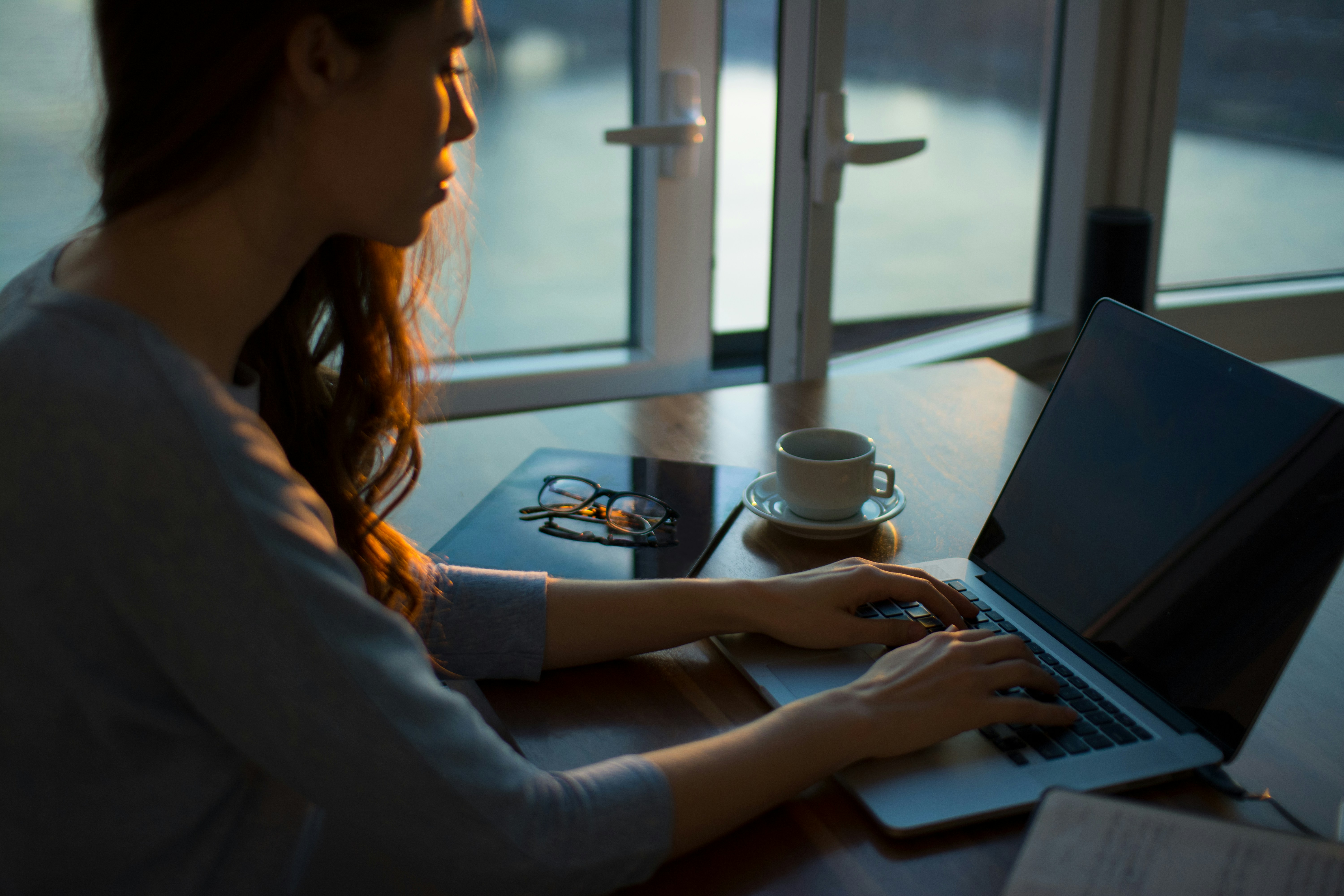 Woman searching on her laptop