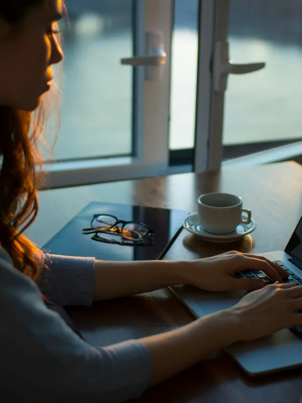 Woman searching on her laptop