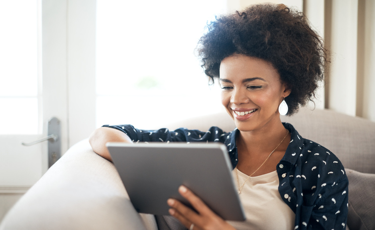 person looking at share of voice on tablet