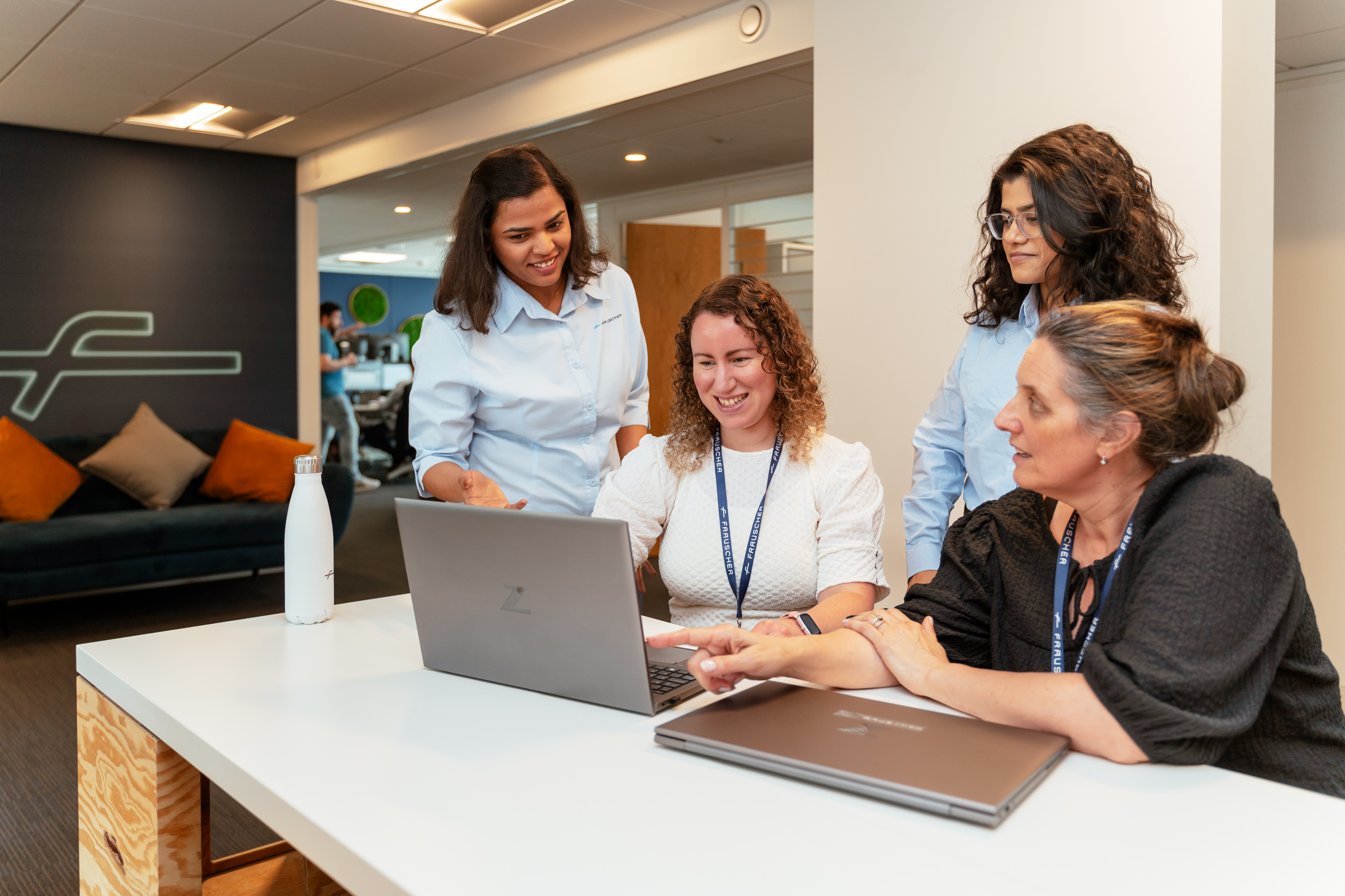 Beatriz Miguel, QEHS Manager, Frauscher UK & IE, pictured second from left, collaborating with colleagues