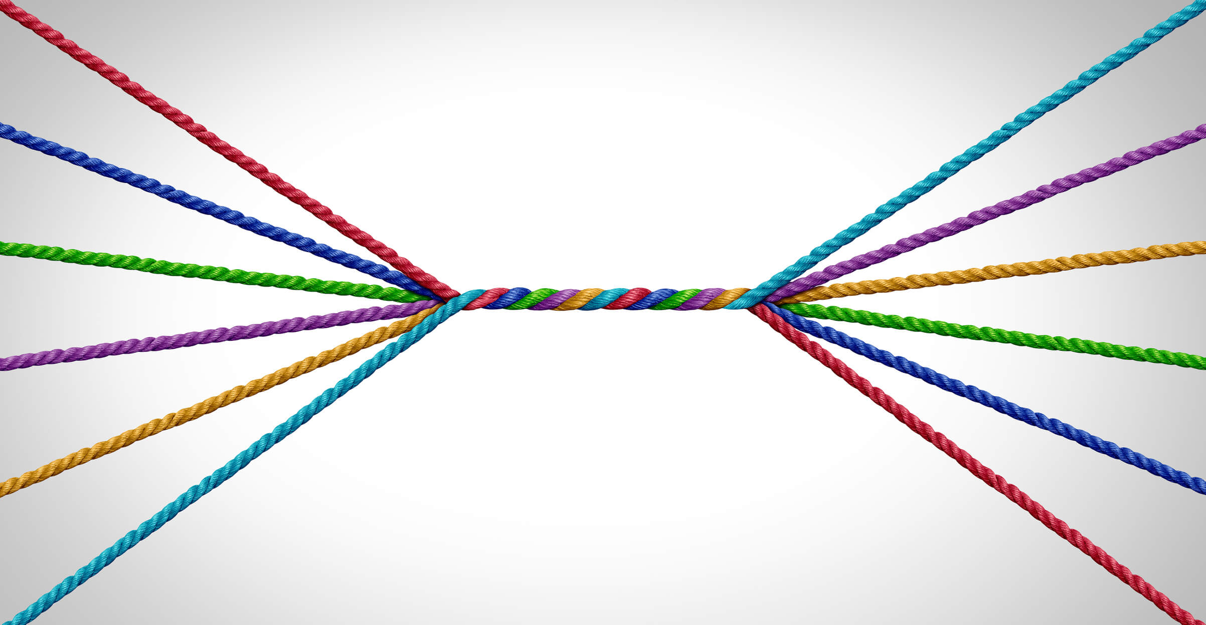Connecting together and unity teamwork concept as a business metaphor for joining a partnership of diversity as diverse ropes connected together for a corporate symbol for cooperation and working collaboration.