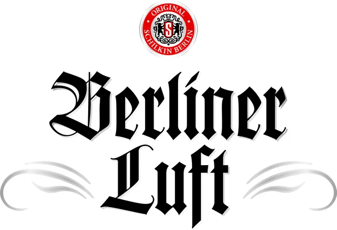 Logo von „Berliner Luft“ mit stilisierter schwarzer Schrift und einem roten, kreisförmigen Emblem darüber, das ein dekoratives Wappen zeigt.