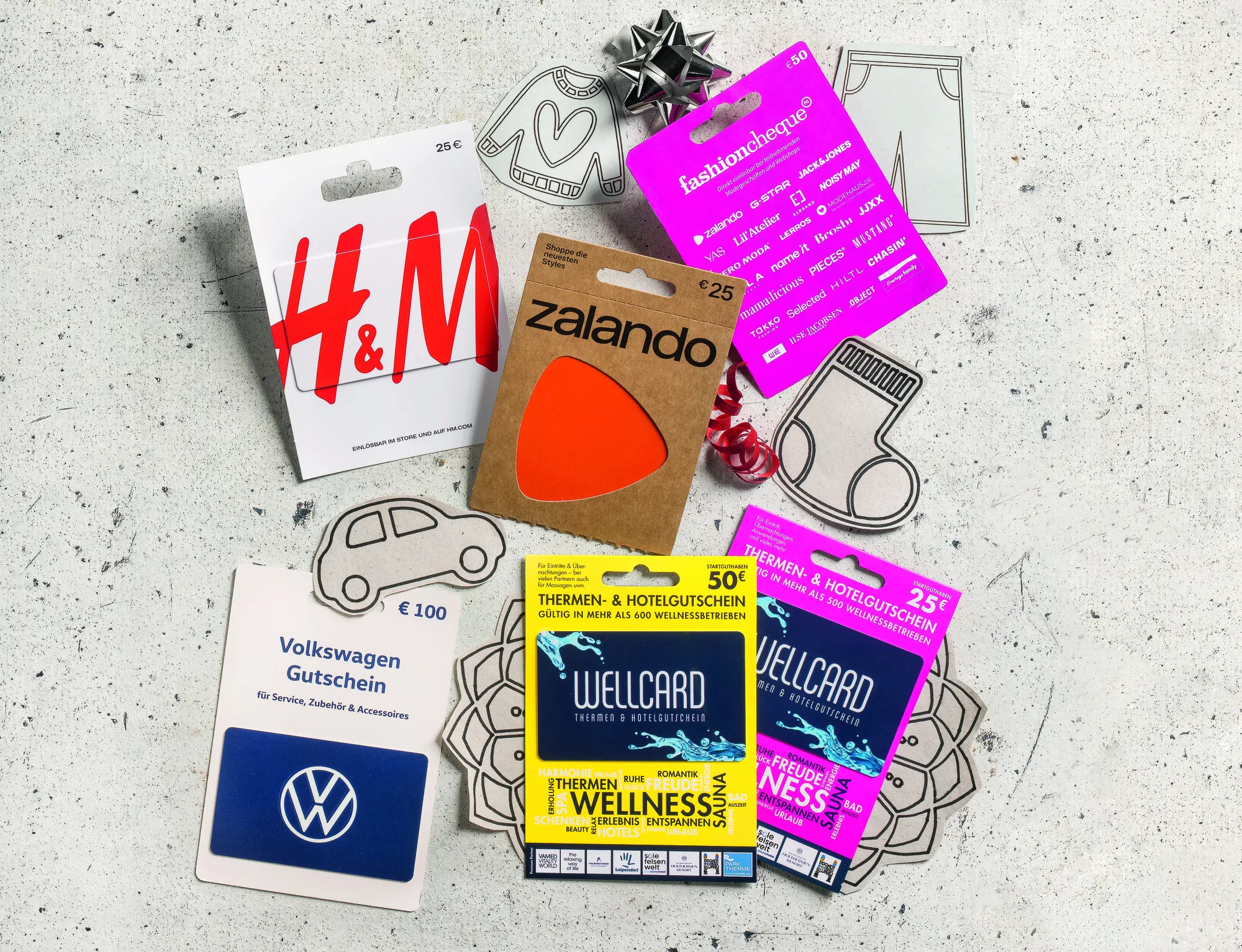 Mehrere verschiedene Geschenk- und Gutscheinkarten von H&M, WellCard, Zalando, VW & Co.