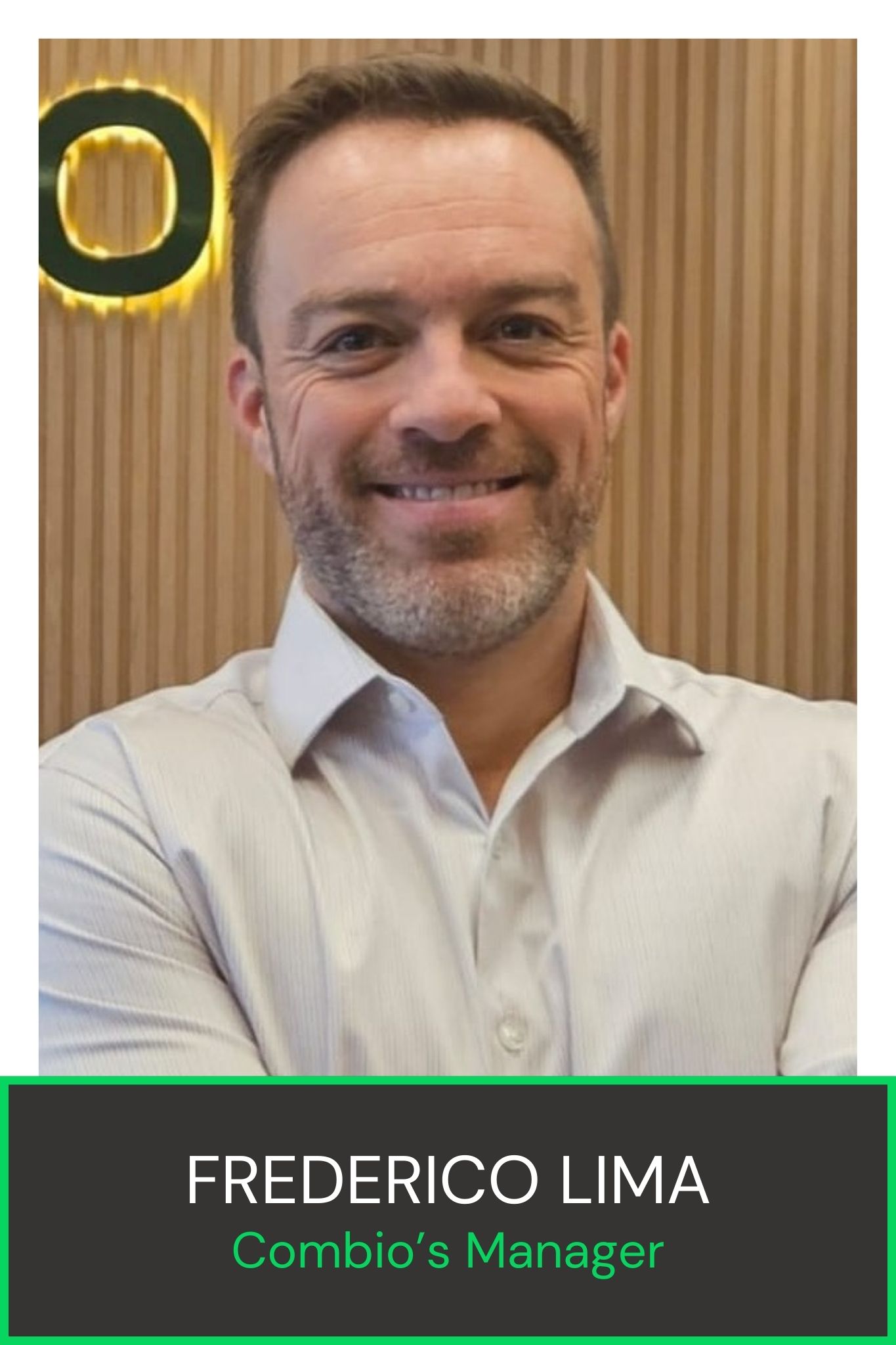 Man smiling, wearing a white shirt, standing in front of a wooden background with partial logo visible. Text at bottom reads "Frederico Lima, Combio's Manager."