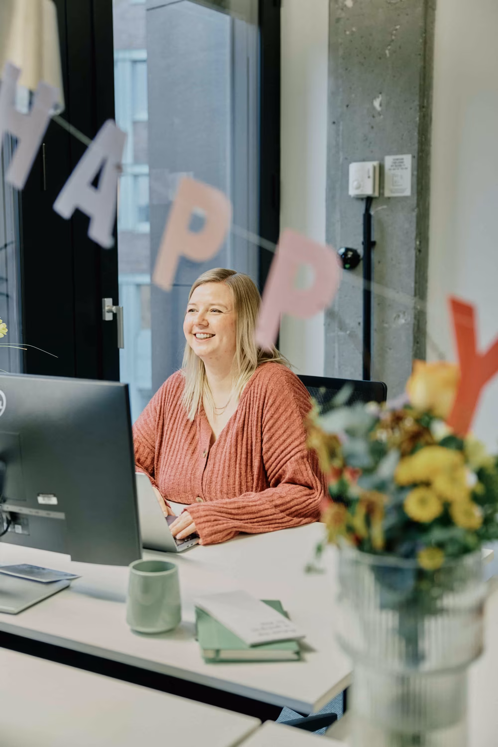 Employees chatting at the ABOUT YOU office