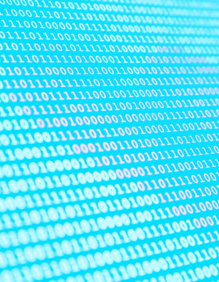 Close-up of binary code in white and pink on a blue background, representing digital data or computing.