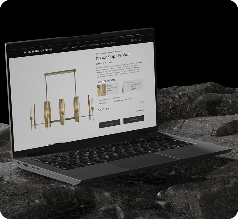 Hubbardton Forge product page for the Passage 8-Light Pendant shown on laptop