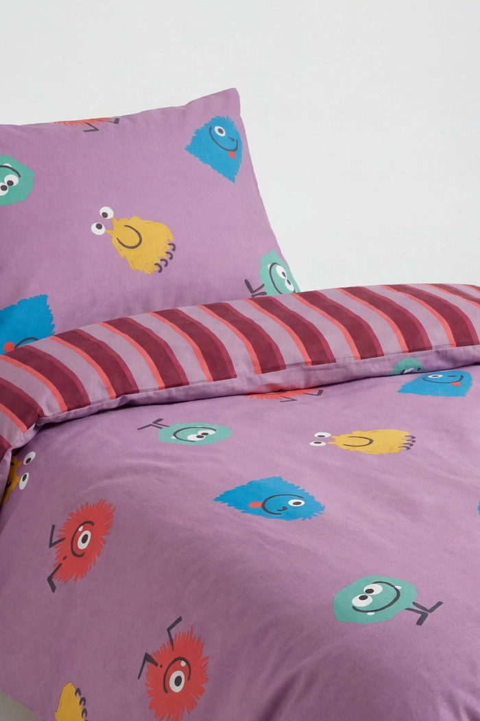 Roze Woody kinderdekbedovertrek met vrolijke monsterprint