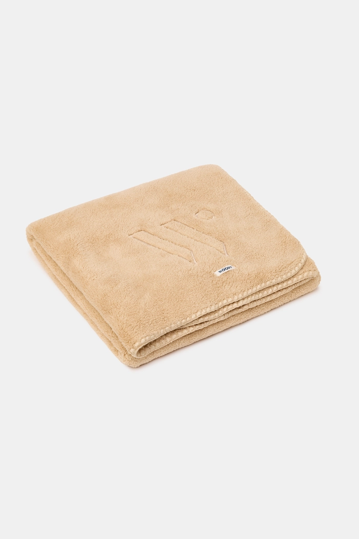 Beige plaid van Woody, zachte woonaccessoire