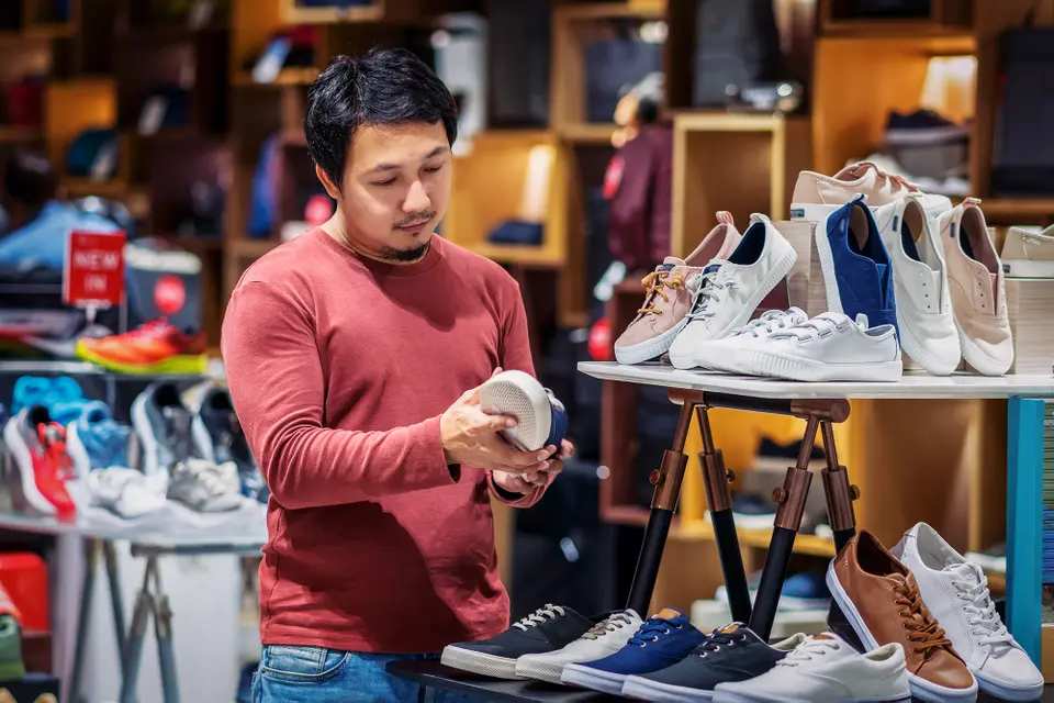 Person looking at shoes in a store