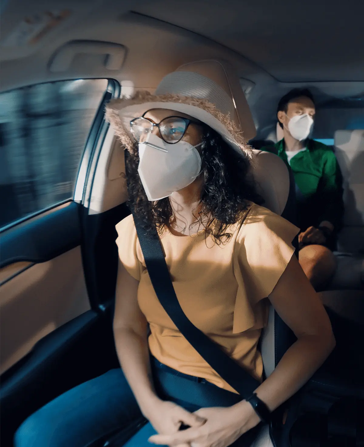 Woman in a car as a passenger