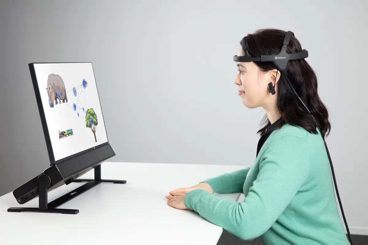 Woman looking at Tobii Pro Spectrum