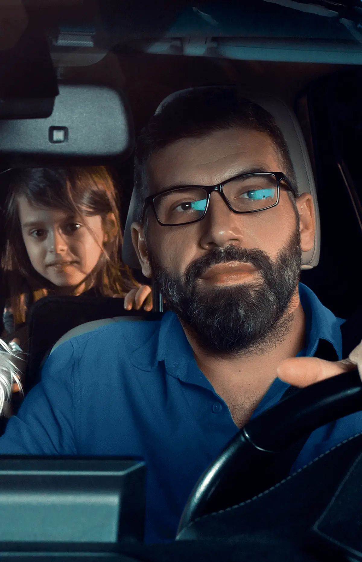 Child and father in a car