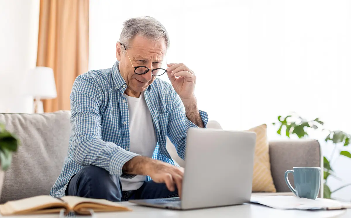 Older man at a computer