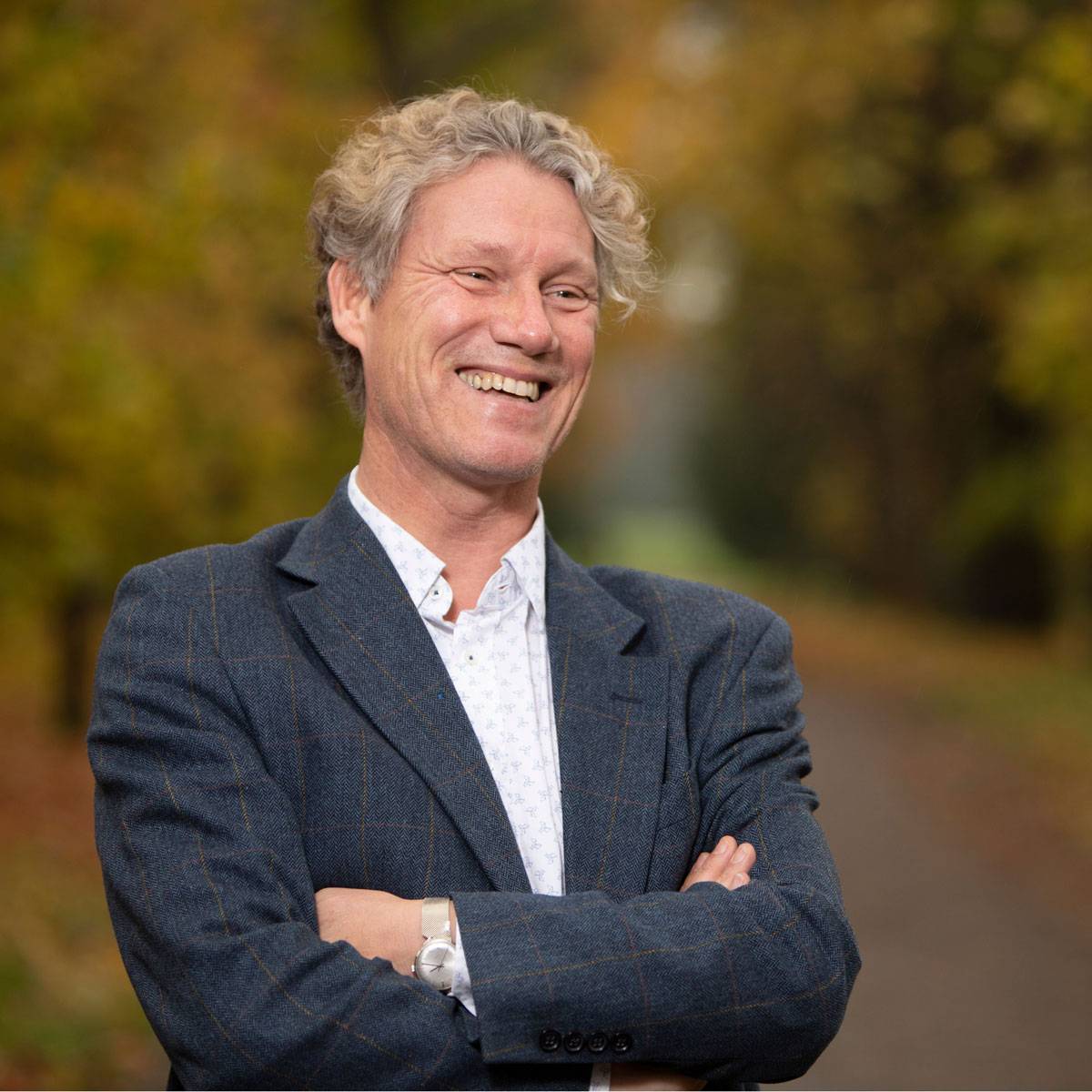 Potrait photo of a man smiling