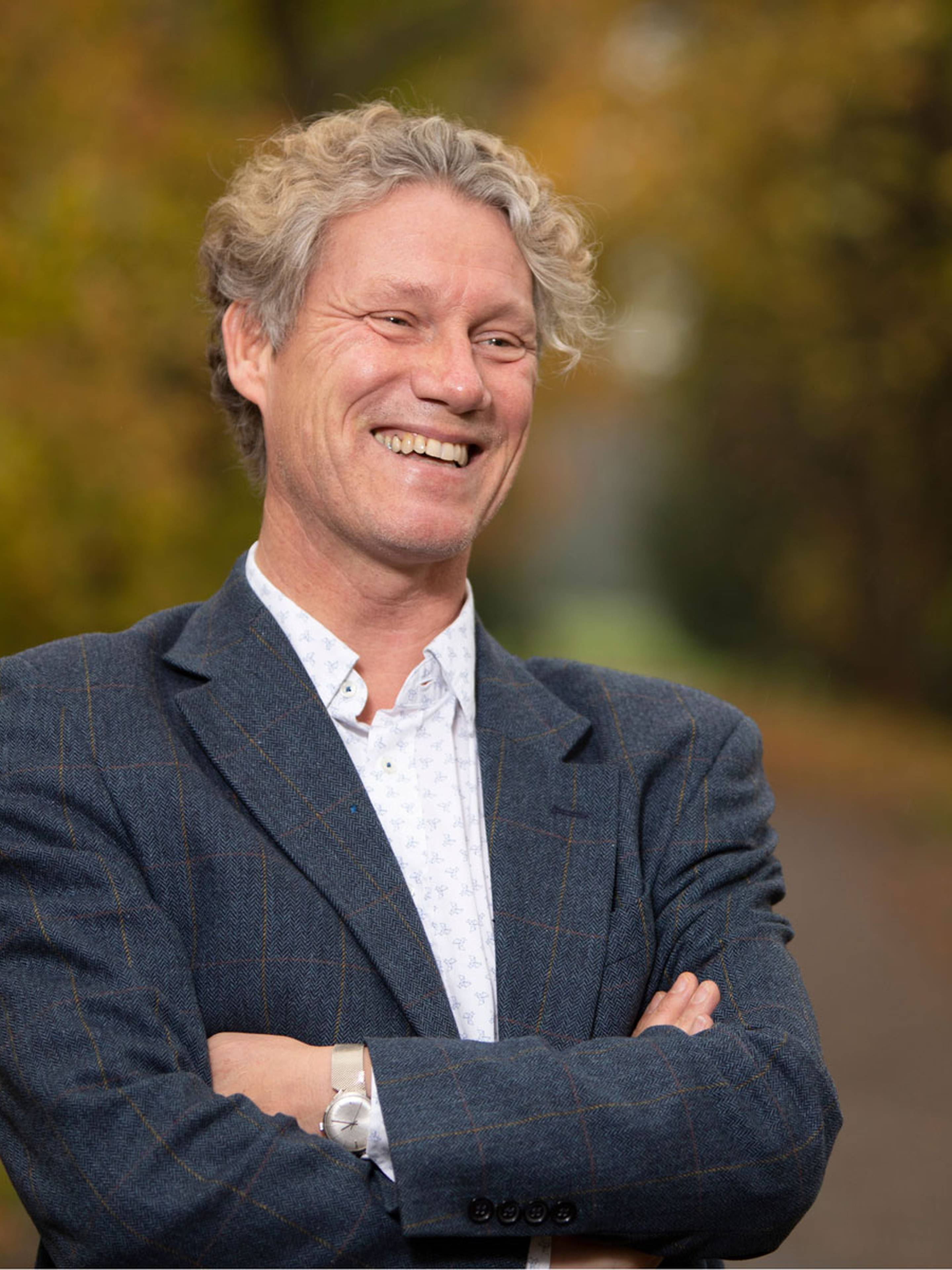 Potrait photo of a man smiling