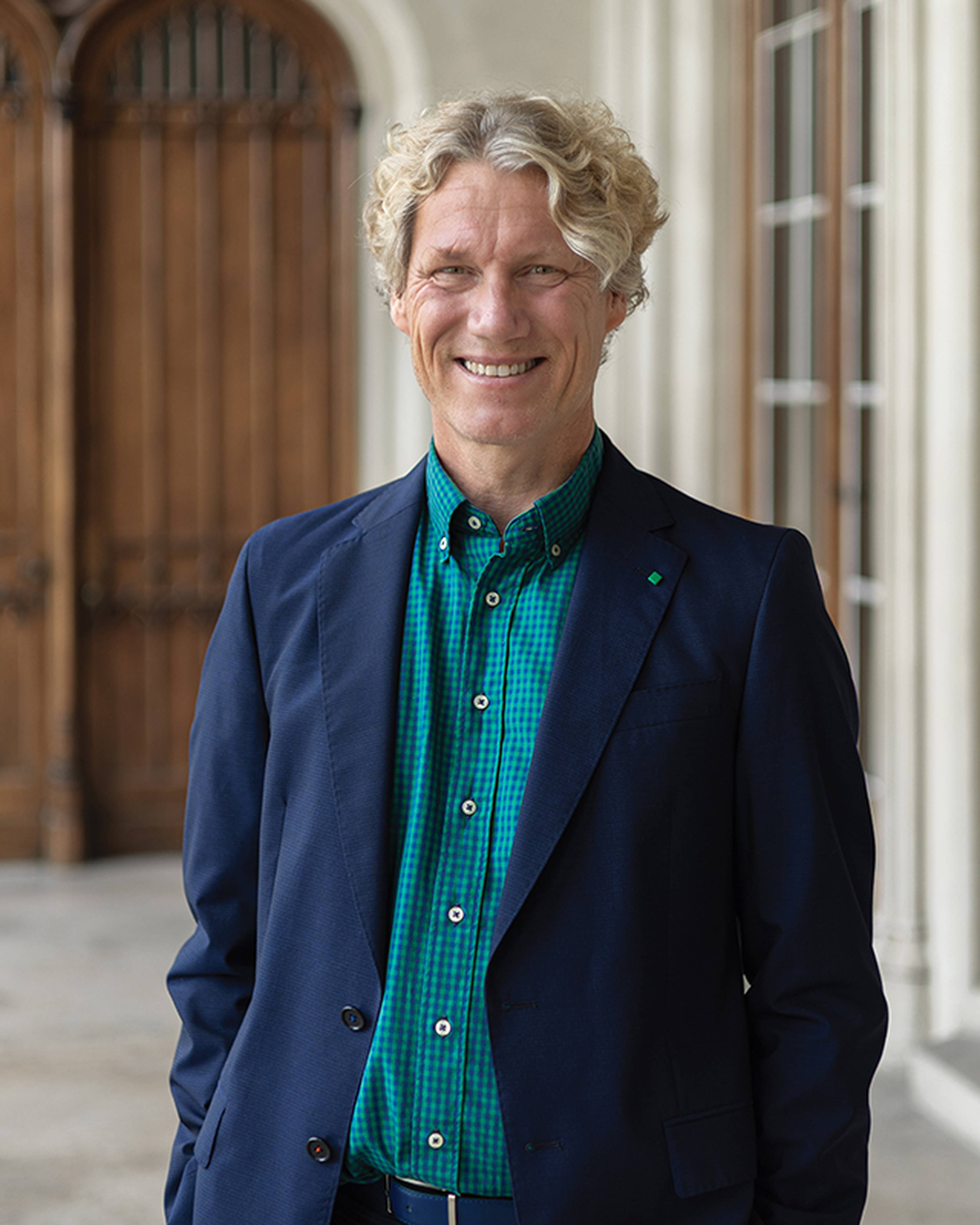Potrait Photo of a man standing outside the Ashridge building