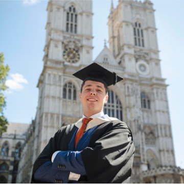 Graduate in front of church