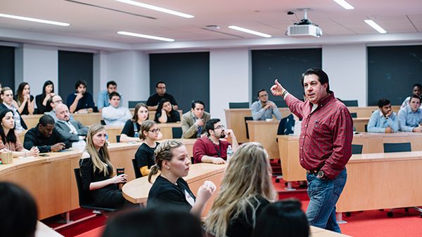 Professor presenting to classroom in Boston