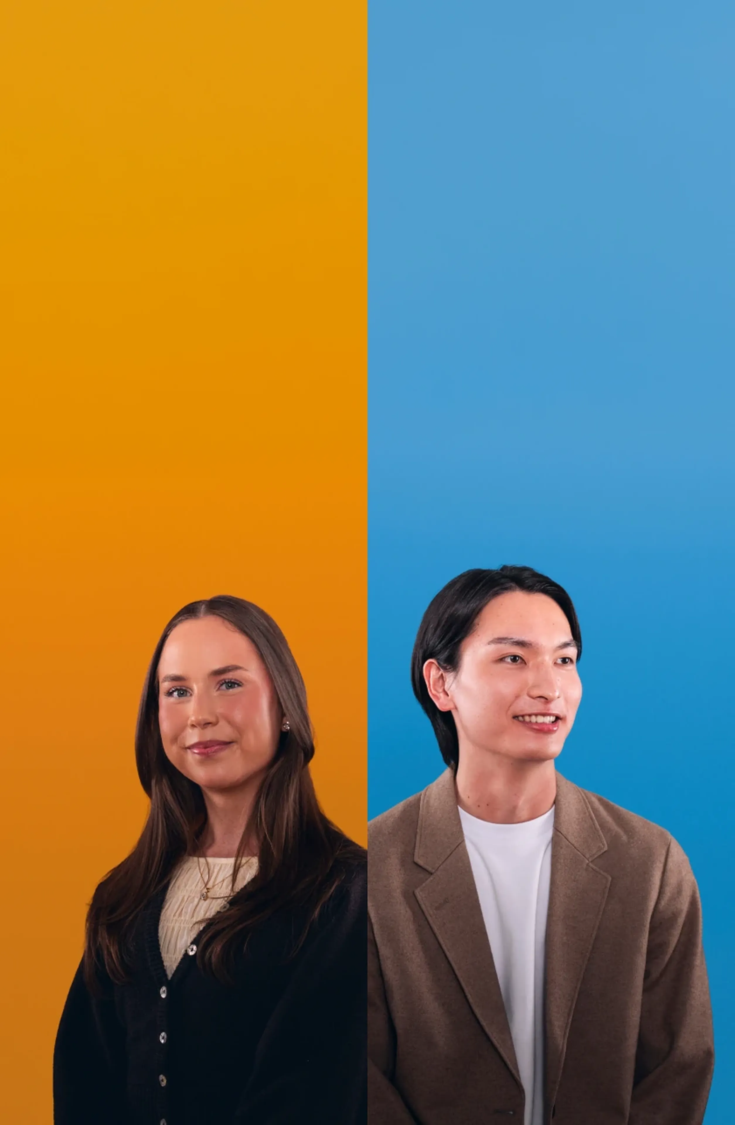 A woman and a man, smiling, stand against orange and blue backgrounds, respectively.