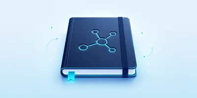 A blue notebook with a molecular design on the cover, closed with an elastic band and featuring a glowing blue bookmark against a light background.