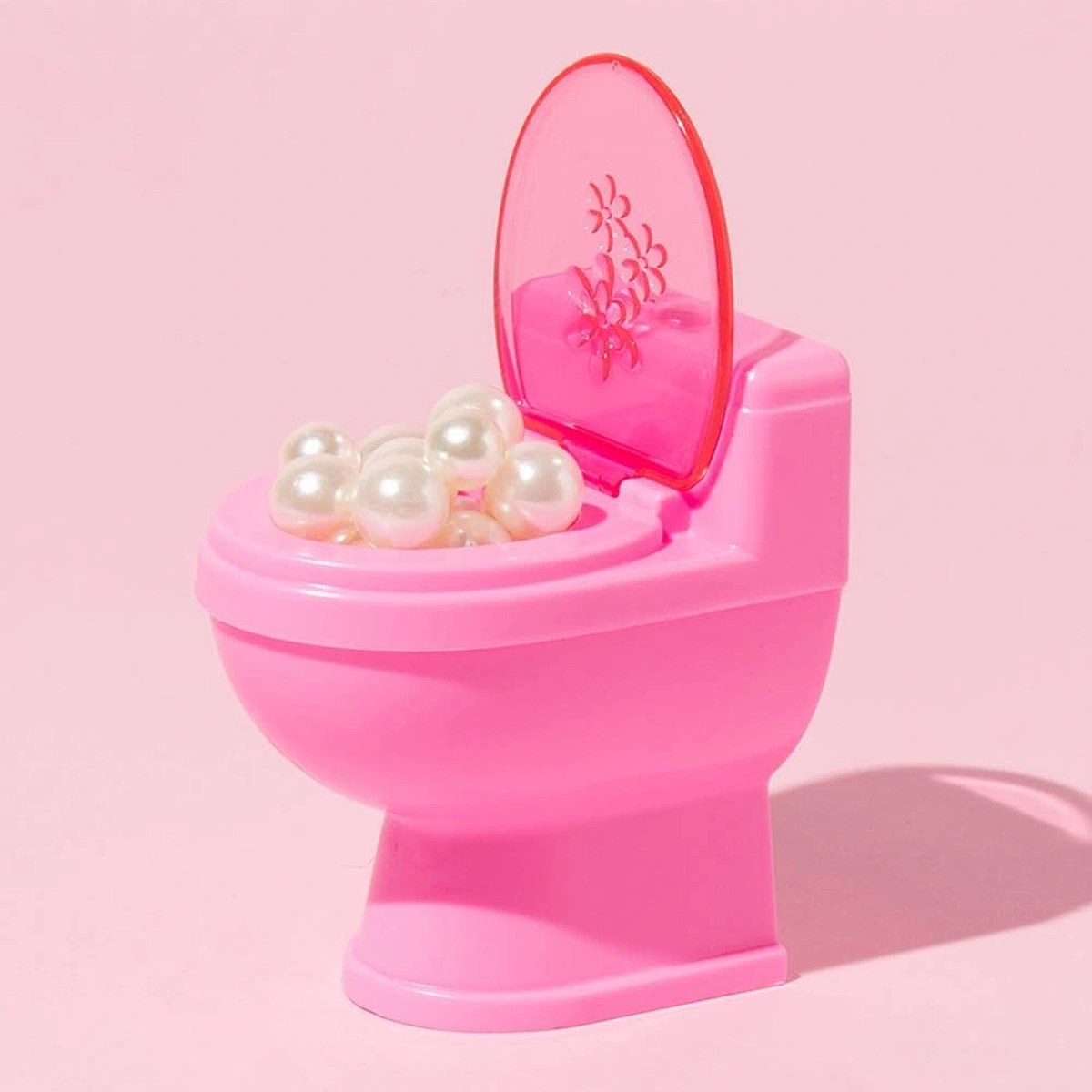 header - wc - roze - parels - toilet - shutterstock