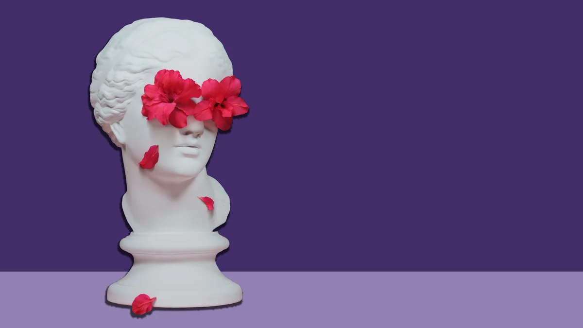 Standbeeld - hoofd - bloemen