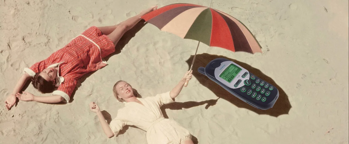 [P] Telefoon - oververhit - zon - warm - strand - parasol
