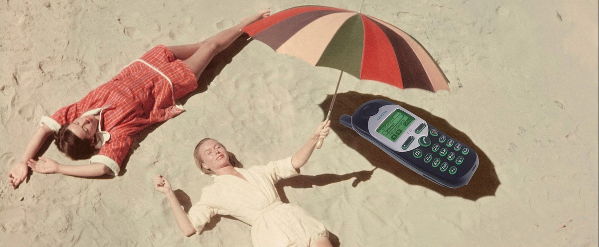 [P] Telefoon - oververhit - zon - warm - strand - parasol