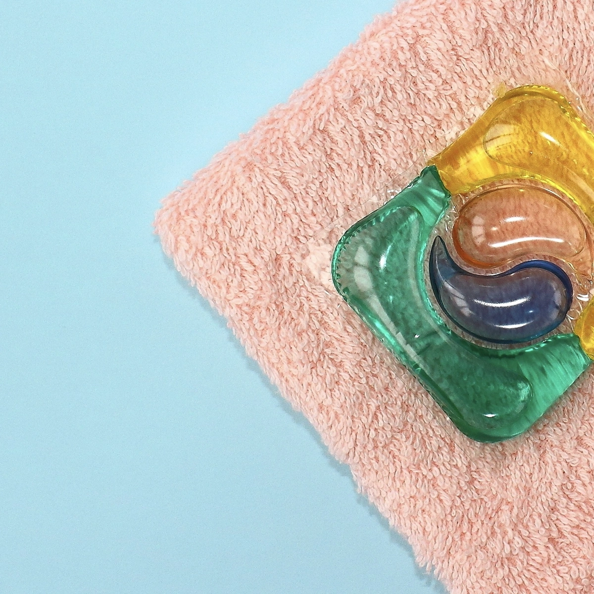 Header - wascapsule - wasmiddel - tapijt - shutterstock