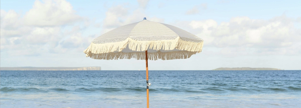 Header - parasol - strand - zee - zomer - vakantie - Unsplash