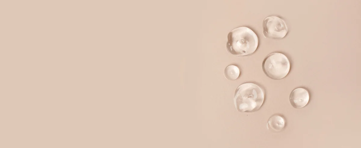 Header - olie - huid - product - vocht - druppel - water - skincare - shutterstock