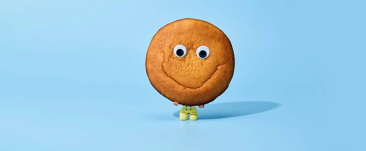 header - koek - baby - blauw - oogjes - speelgoed - smiley - tom ten seldam