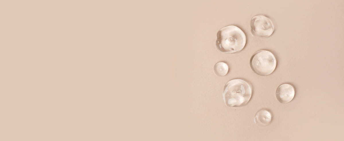 Header - olie - huid - product - vocht - druppel - water - skincare - shutterstock