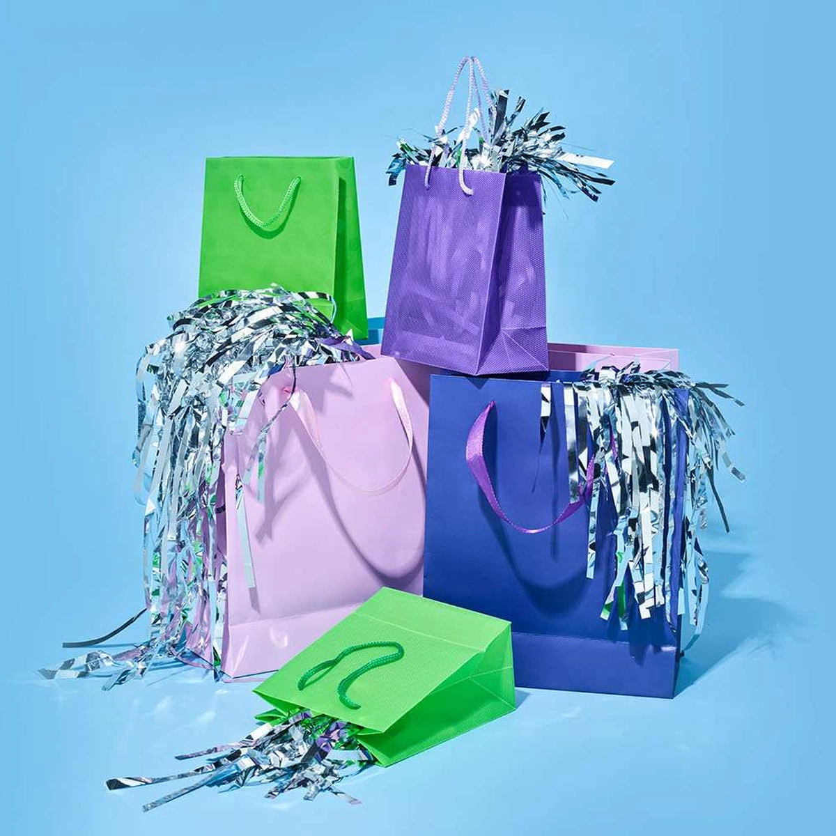 header - pakketjes - tasjes - glitters - cadeaus 