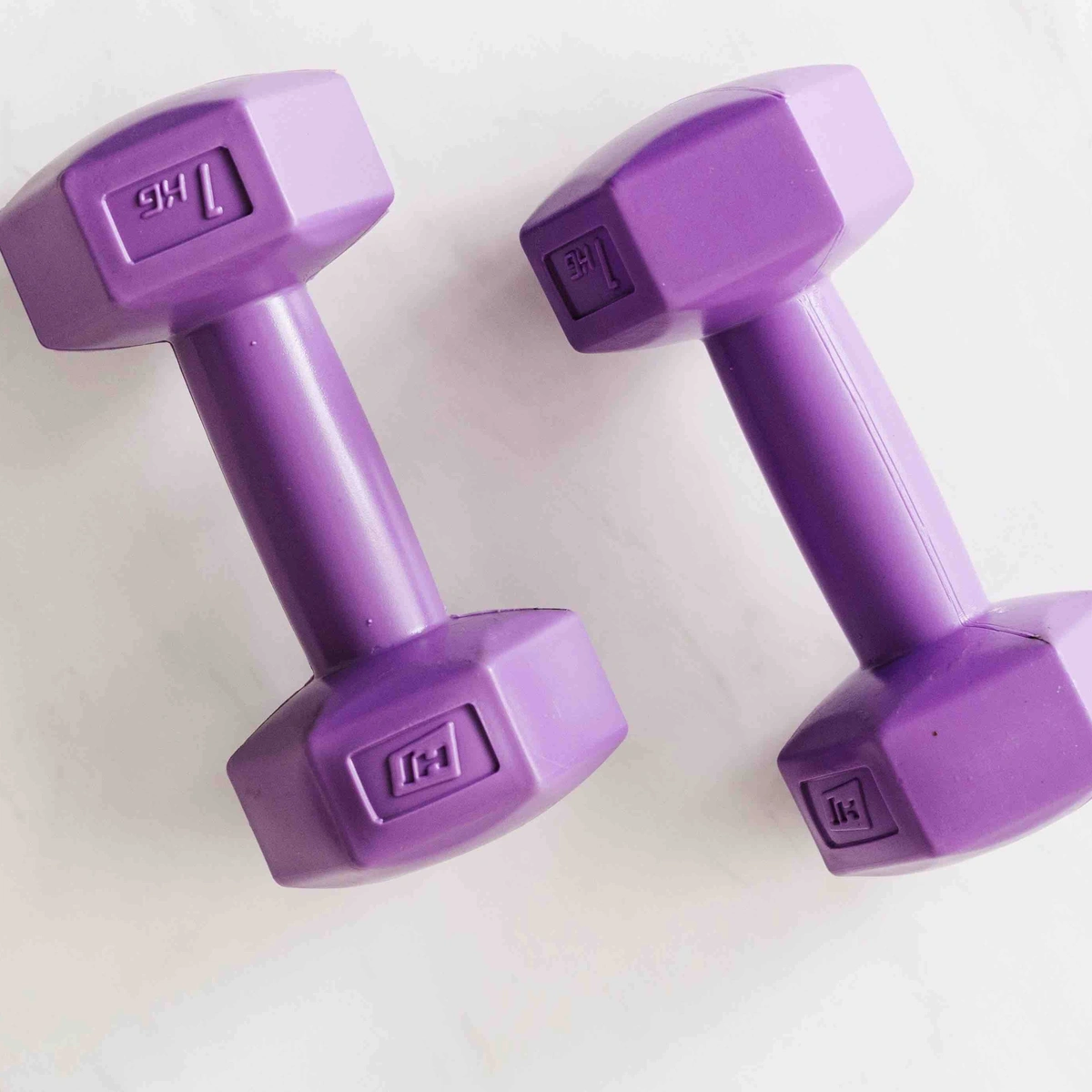 Sporten - header - dumbells - gym - pexels