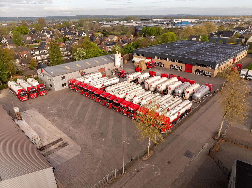 Aerial view of the BAAN Rijssen Transporten depot in the Netherlands with the full fleet of silo and bulk transport vehicles