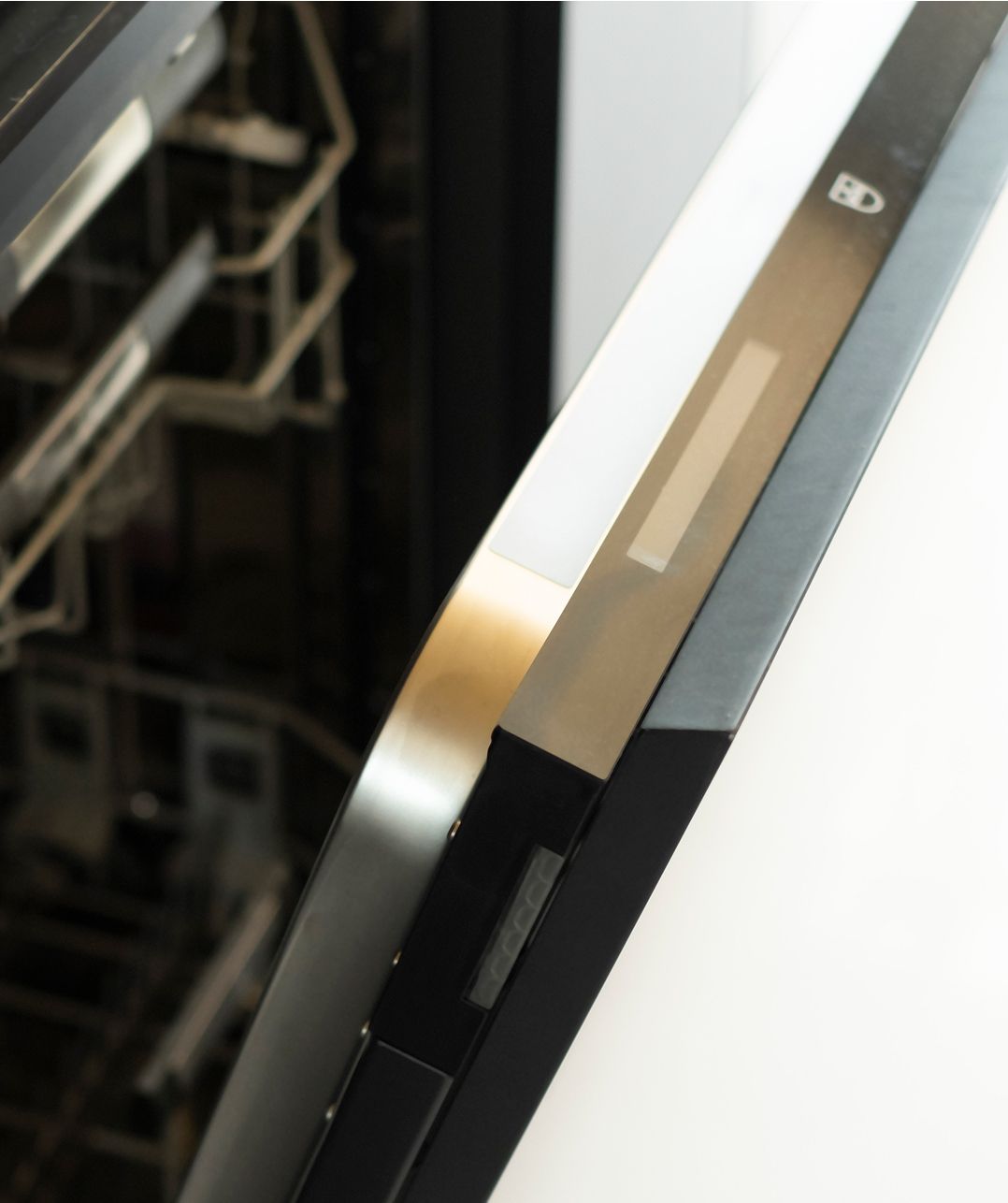 Integrated V-ZUG appliances in a black-and-white kitchen, Sayaneh