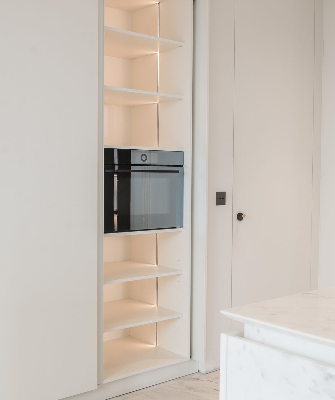 Kitchen concealed behind a pocket door, Achrafieh