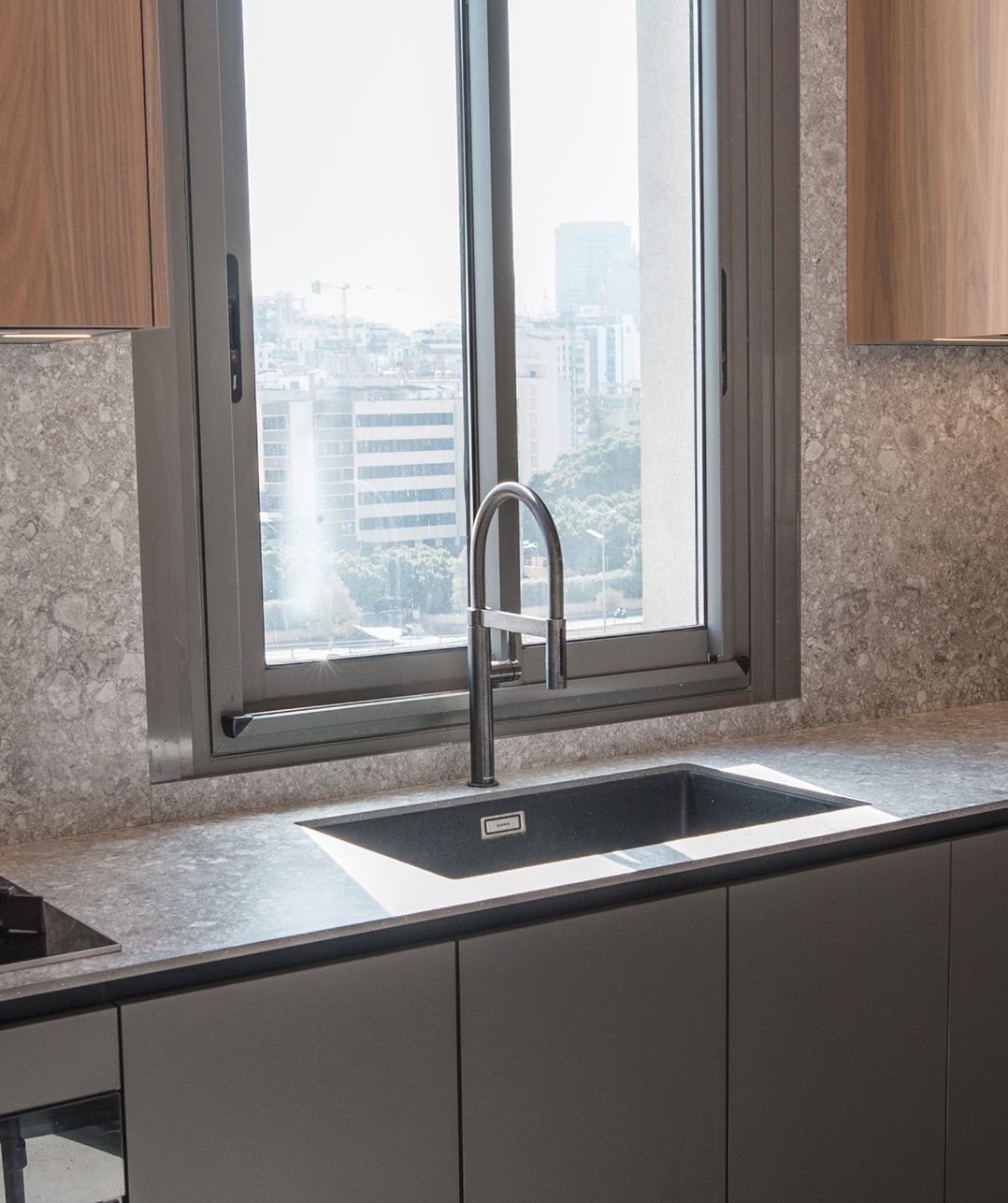 Integrated walnut and graphite cabinetry, Sin El Fil