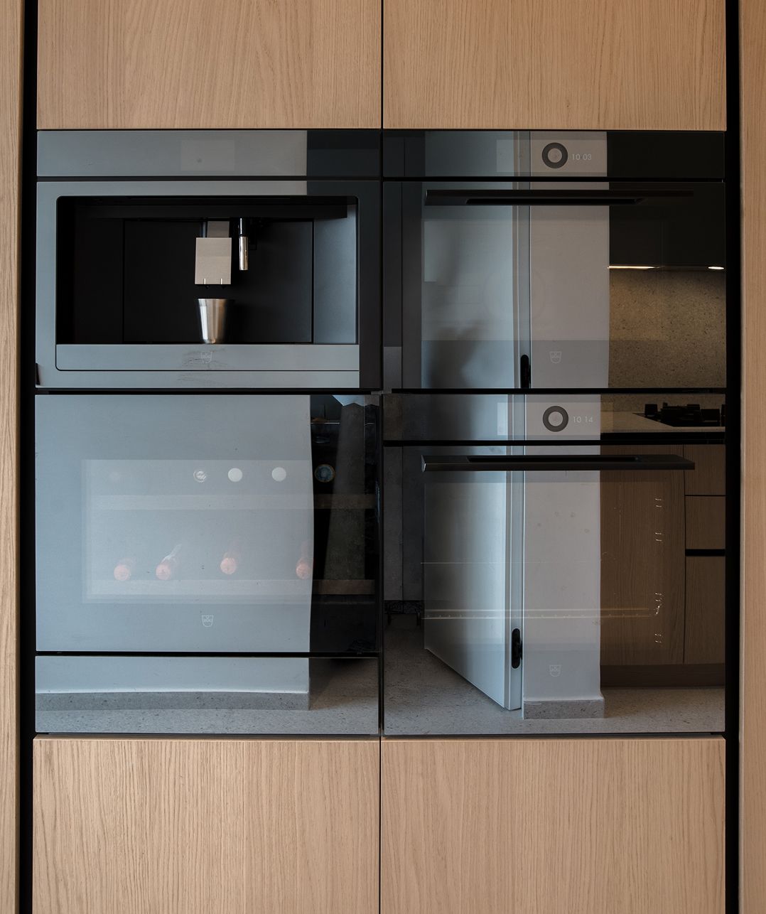 Integrated V-ZUG appliances in Ivory Oak cabinetry, Jounieh