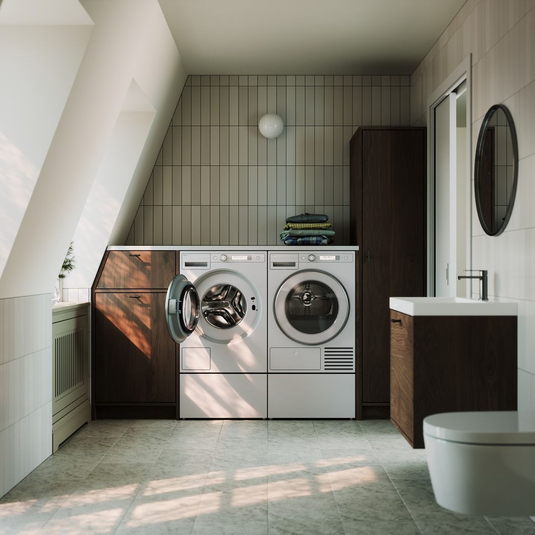 ASKO washing machine and dryer on pedestal drawers