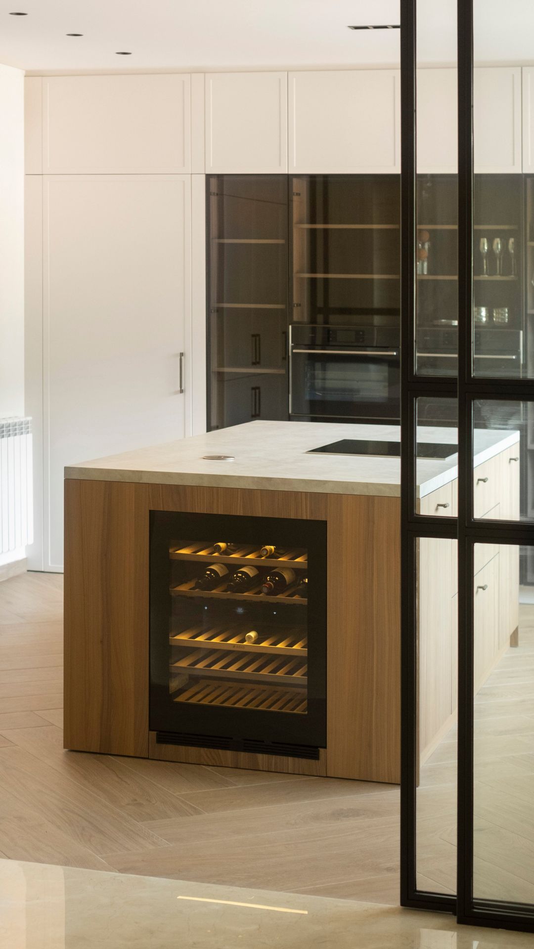 Framed white lacquer cabinetry with classical detailing, Rabieh