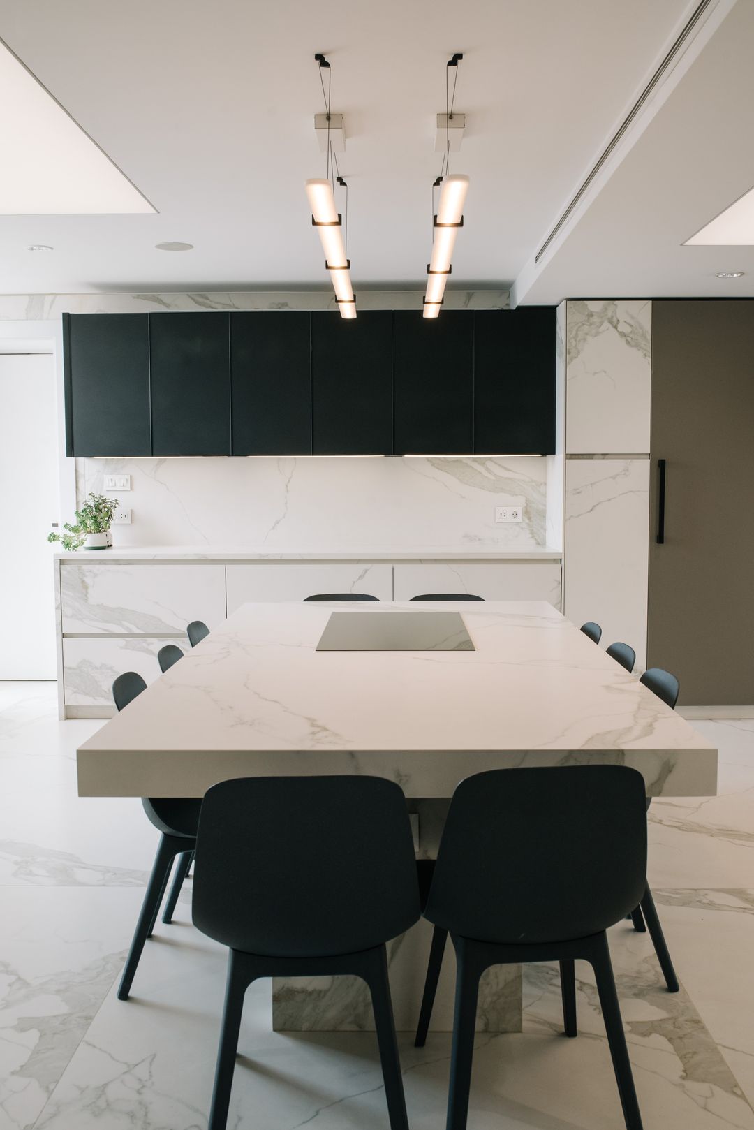 Induction hob set into a Statuario dining table, Ashrafieh