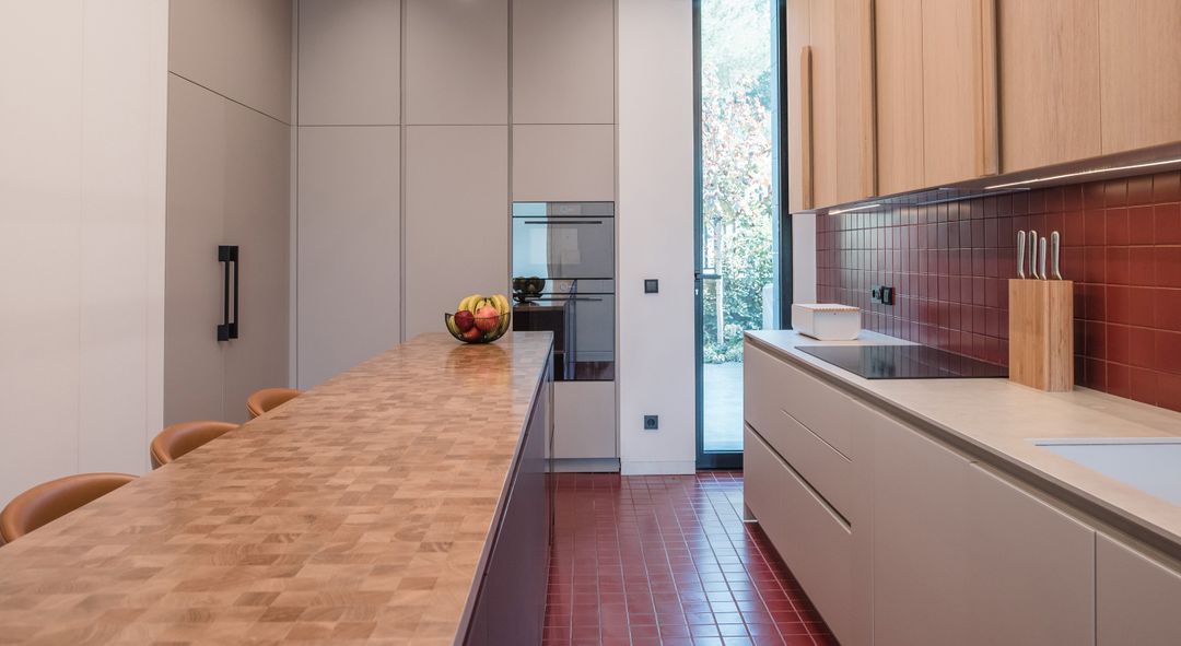 Chili Ground and Ivory Oak kitchen in Cornet Chehwan
