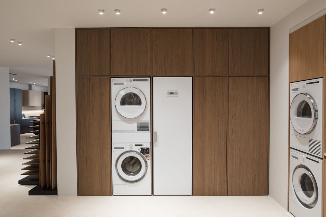 Copper details and pocket door in the oak laundry room, Kitchen Avenue showroom