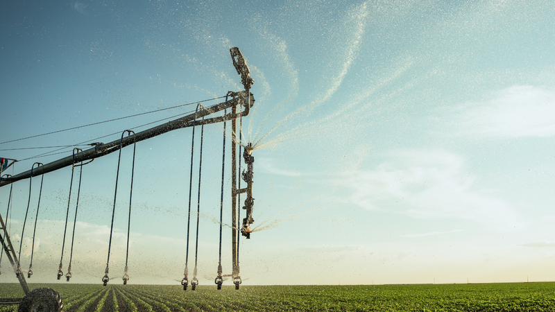 Technical view of pressure variation, wind, and nozzle wear affecting end-of-system irrigation