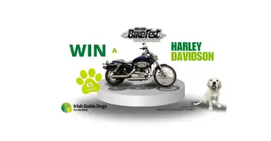 A poster showcasing the 2025 Harley Davidson motor bike, with the Irish Guide Dogs for the Blind logo and the BikeFest Ireland logo.