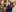 An academic ceremony where Jim is in a graduation gown receiving a Degree of Doctor of Laws from Professor John O'Halloran, University College Cork, with Jim's standing nearby. Portraits hang on the wall.