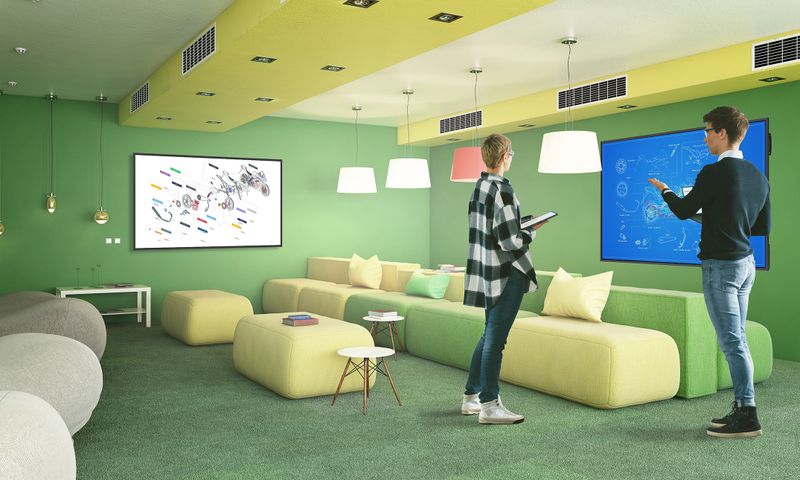Display Share app being used to share content from a laptop or tablet device to the Optoma N-series displays on two walls